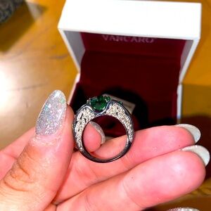 Green heart ring with wings